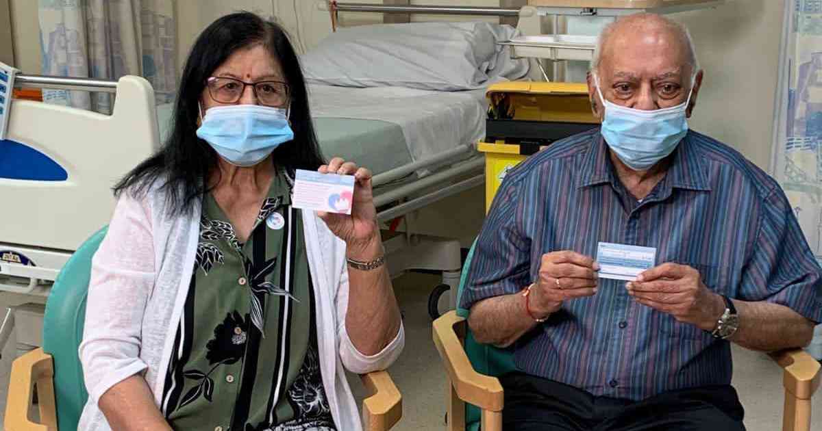 Indian-origin couple Ranjan and Hari Shukla at Newcastle Hospitals to get the first dose of two-shot Pfizer Covid-19 vaccine, on Tuesday. | NHS England Media/ Twitter