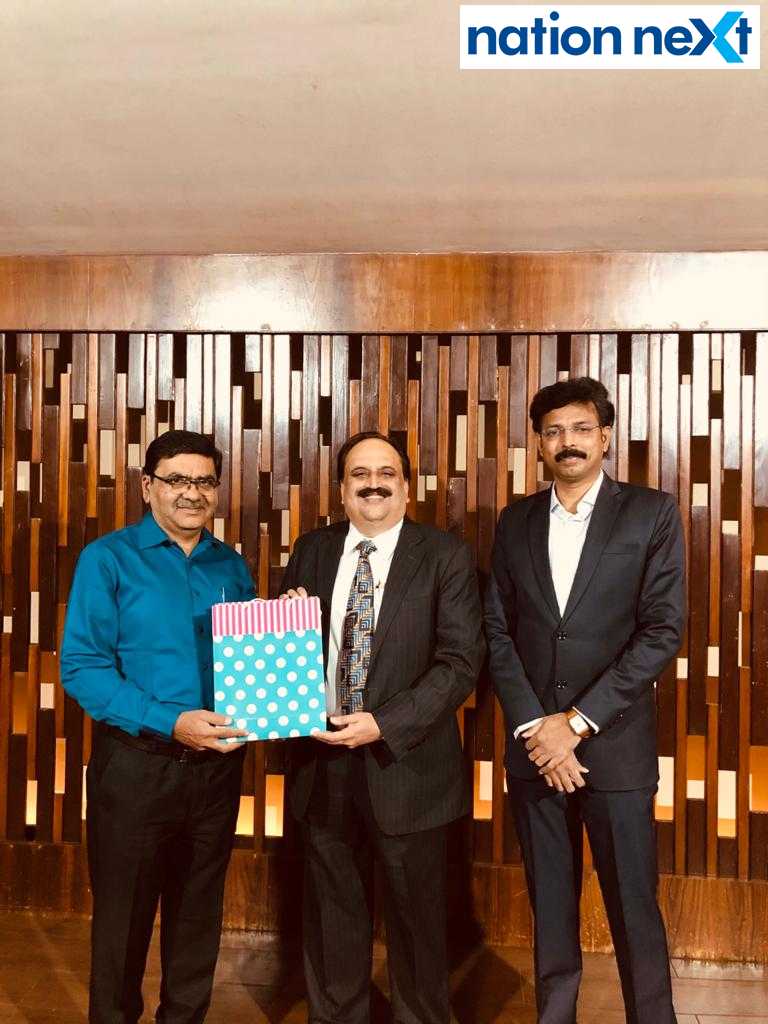 Dr Atmaram Pawar felicitating Sanjeev Pendharkar
