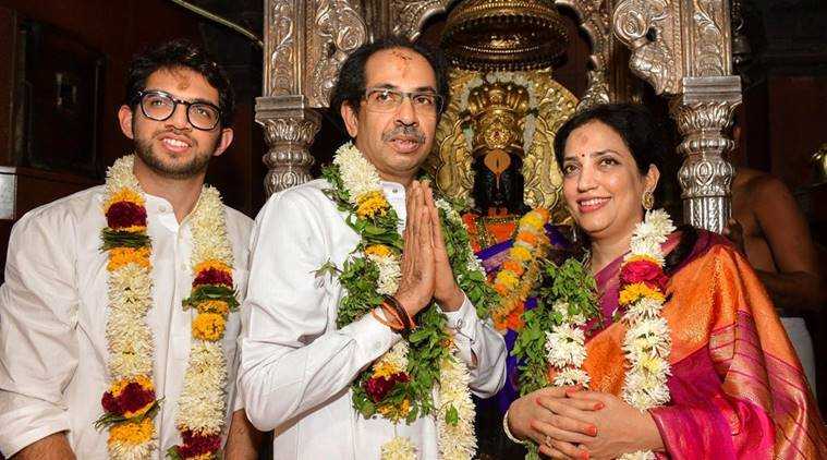 Maharashtra Chief Minister Uddhav Thackeray, his wife Rashmi Thackeray and son Aditya Thackeray offer prayers at a temple in Pandharpur. (PTI/File)
