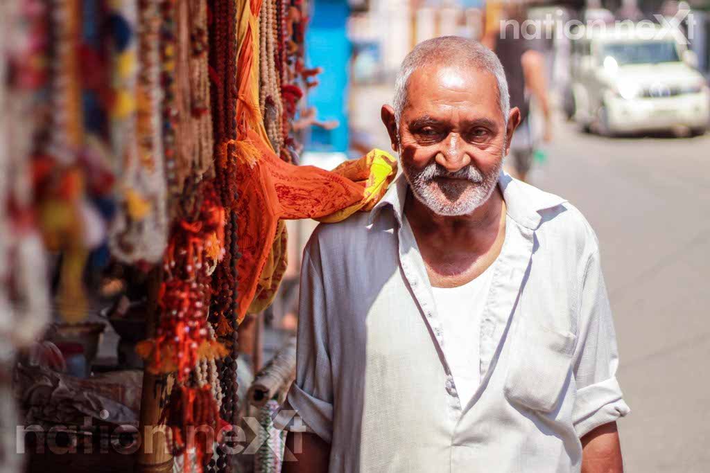 An old man sells artificial jewellery on the way to Laxman Jhula at Rishikesh