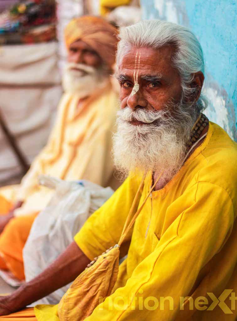 A sage poses for the photographer at Rishikesh
