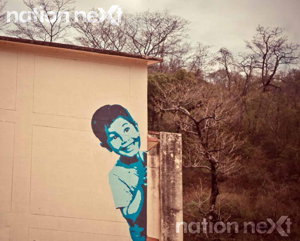 A wall painting at a public toilet building at Rishikesh
