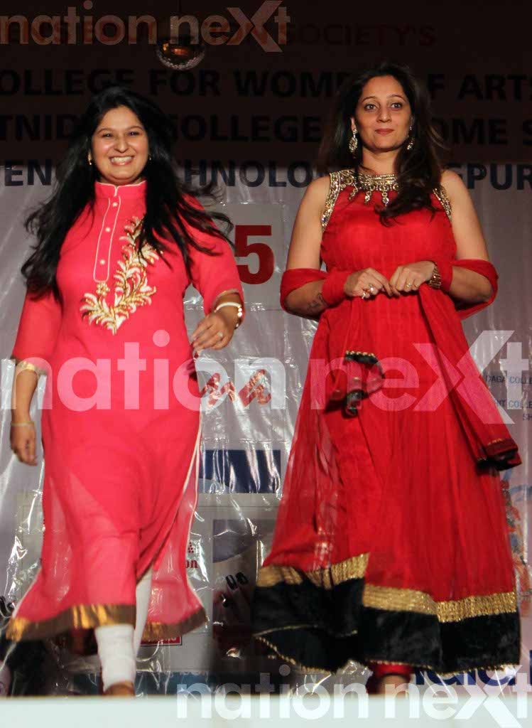 Sonal Malkan and Swati Banerjee walk the ramp during the cultural fest 'Jashna,' co-presented by India Next Media's digital newspaper Nation Next