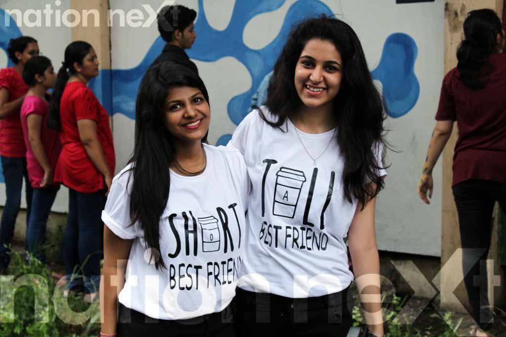 Megha Garg and Rashi Wadhwani, students of LAD College at Graffiti Wall, a wall designing programme organized at IIID Design Yatra