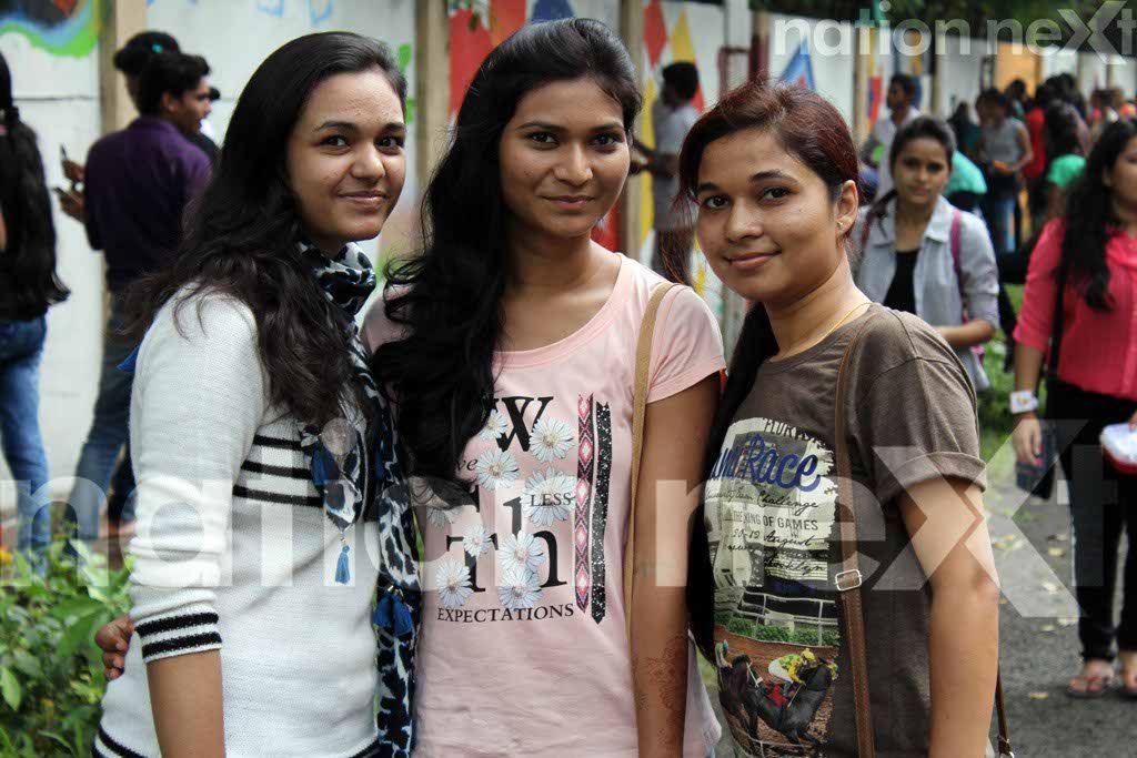 Sakina Bohra, Vaishnavi Lanjewar and Priyal Kharbikar, students of LAD College at Graffiti Wall, a wall designing programme organized at IIID Design Yatra