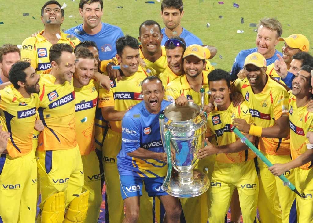 Chennai Super Kings celebrate after winning the final CLT20 match against Kolkata Knight Riders at M.Chinnaswamy Stadium in Bangalore, on Oct.4, 2014. (Photo: IANS)