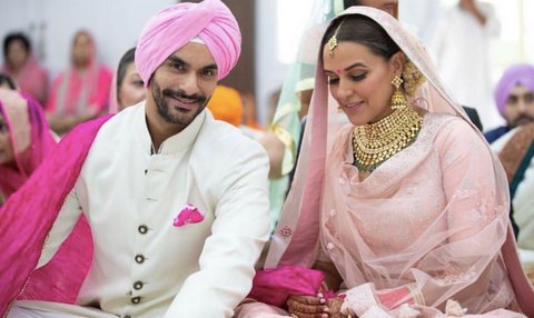 Bollywood actress Neha Dhupia tied the knot today with her ?best friend Angad Bedi in an Anand Karaj ceremony in a Gurudwara in South Delhi.