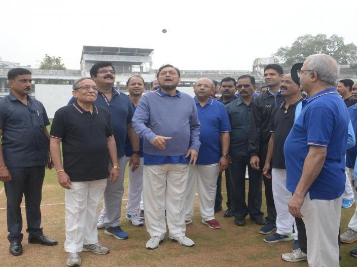 CJI Sharad Bobde during the toss during a match between Judges XI and HCBA President XI held at VCA Stadium in Civil Lines in Nagpur.