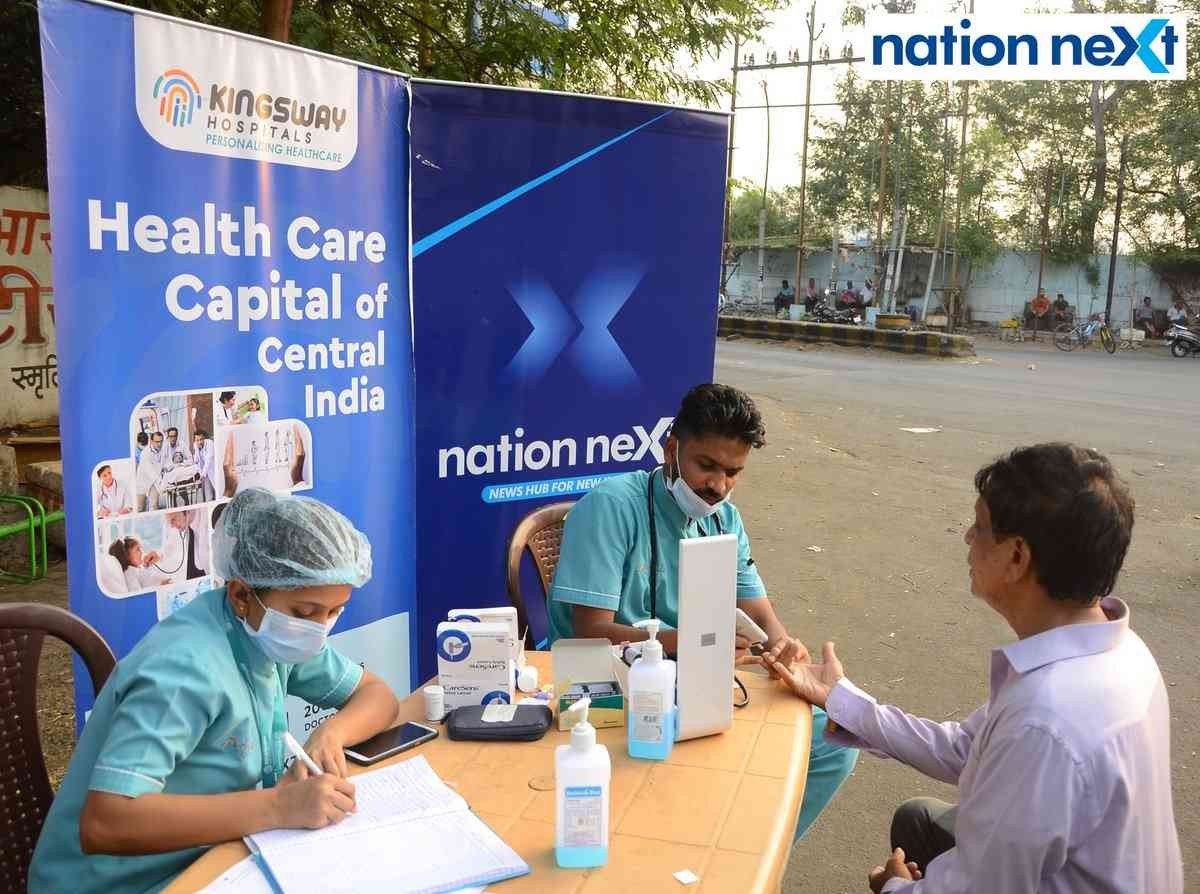 Pooja Lohkare and Avinash Sawankar with a citizen during the free health check-up drive by Nation Next Foundation and Kingsway Hospitals in Nagpur